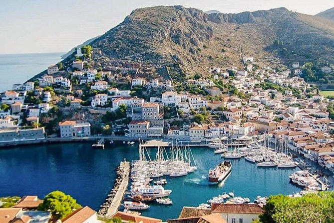 Aegina, Poros & Hydra Islands Speed Boat Day Cruise - Poros port: coastal walking, the Old Watch, and mezedes