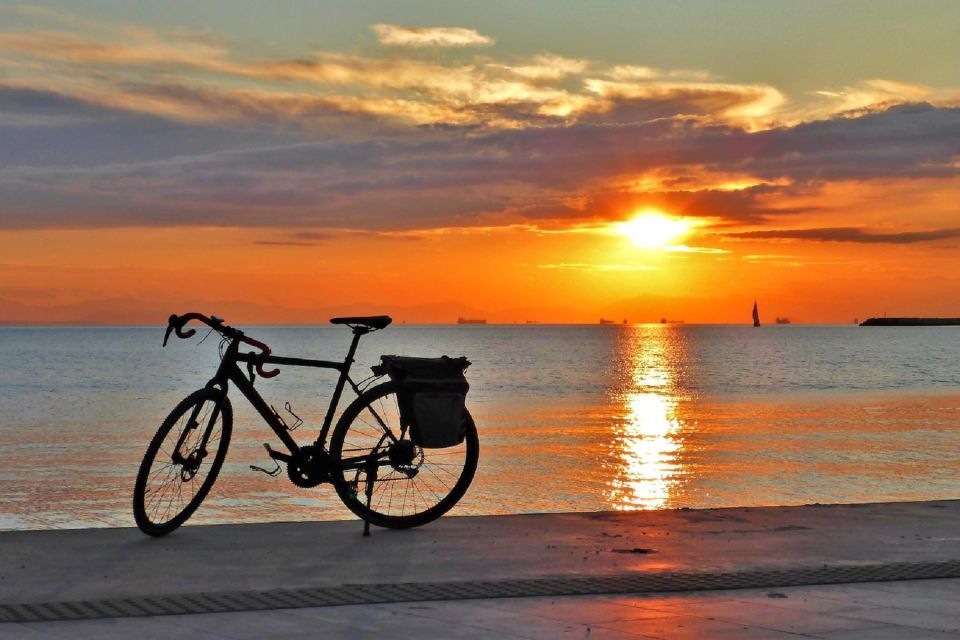 Athens: Authentic neighborhoods & the beach Bike Tour - Sliding under the Acropolis and into Athens’ daily streets