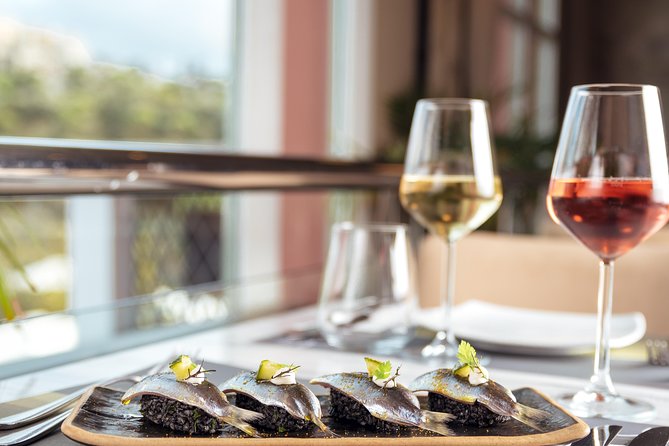 Athens: Greek Wines Tasting with Sommelier and Acropolis Views - How a Greek wine tasting with Acropolis views changes the vibe