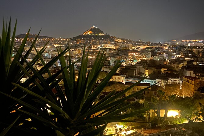 Athens Night Walk and Drinks - Monastiraki after dark: lights, lights, and more people-watching than you expect