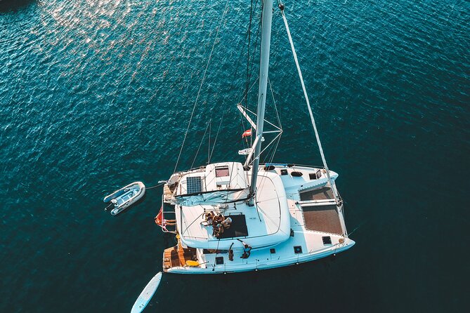 Athens Private Full day Catamaran cruise with meal & drinks - Lunch Onboard: Seafood Pasta, Salads, Appetizers, and Real-Time Relaxing