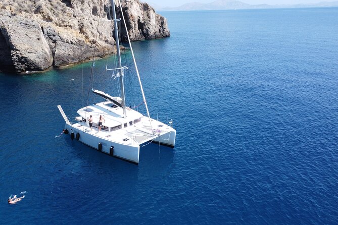 Athens Private Half day Catamaran cruise with meal & drinks - Nisís Idhroúsa: Clear-Water Time and Island Hopping from the Boat