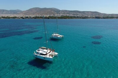 Athens Private Luxury Catamaran Cruise with Traditional Greek Meal and BBQ - Getting on board: welcome drink, safety briefing, towels