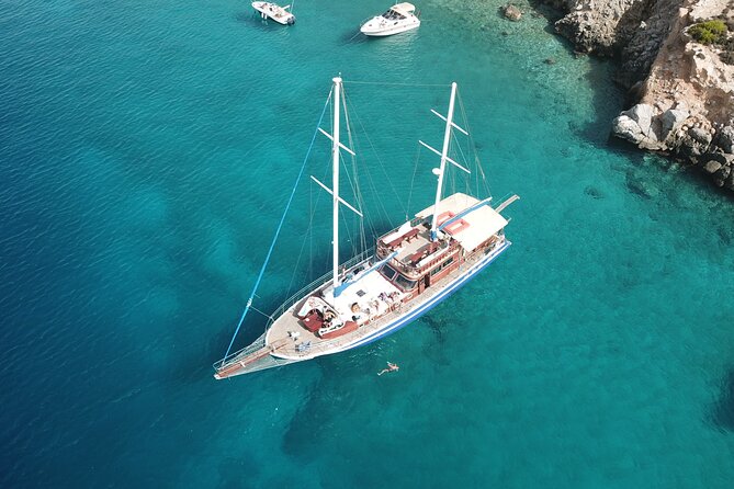 Athens Riviera Half-Day Cruise – Swim, Lunch & Drinks Included! - Stop 2: Vouliagmeni Beach for lunch and views by the Four Seasons area