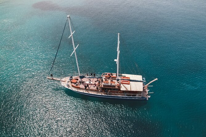 Athens Riviera Sunset Cruise with Snacks and Drinks Included - The real route: pickup, marina start, two swim stops, and the coastal drive-by