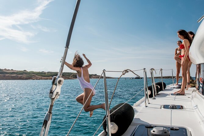 Athens Semi private Morning Catamaran cruise with meal & drinks - Stop 1: Megalo Kavouri swim stop with lunch waiting onboard