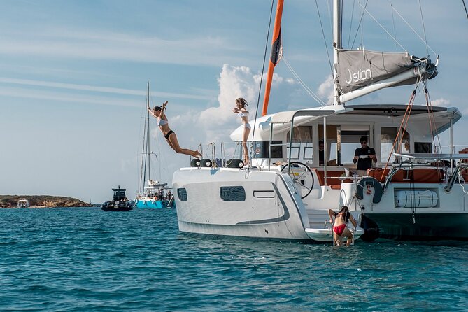 Athens Semi private Morning Catamaran cruise with meal & drinks - Lunch onboard: Greek-style food plus real time to eat well