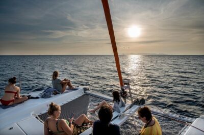 Athens Semi Private Sunset Catamaran Cruise with meal & drinks - First swim stop near Vouliagmeni Beach (weather permitting)