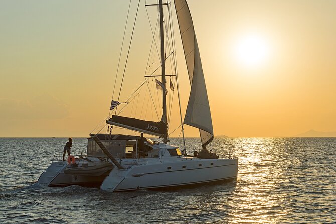 Athens Semi Private Sunset Catamaran Cruise with meal & drinks - Lunch onboard: seafood pasta, salads, and real-time sailing