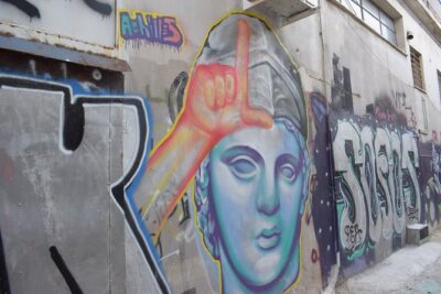 Athens street art tour - Psirri stop: local-favorite graffiti where tradition meets modern Athens