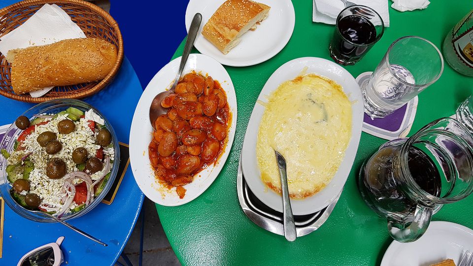 Athens: Traditional Greek food tour in hidden spots - Starting at En Athinas, then stepping into the real market zone