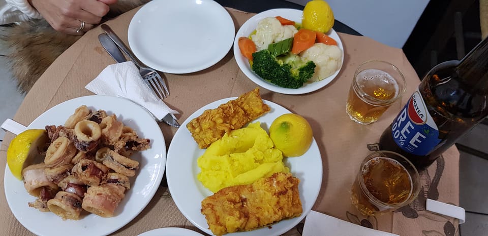 Athens: Traditional Greek food tour in hidden spots - Meze taverna time: two meals, wine from the barrel, and a proper Greek spirit