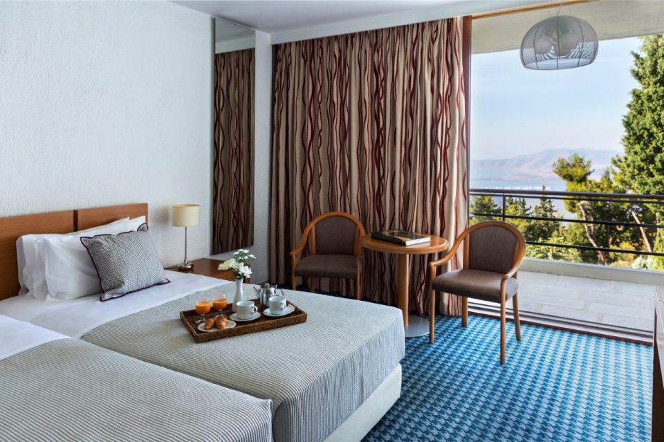 Delphi 2 Day Tour from Athens with Overnight in 4 Star Hotel - Day two: breakfast, then Tholos, Castalia spring, and village walks