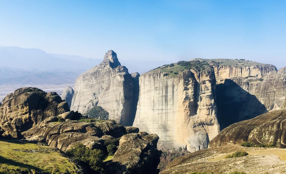 From Athens: Meteora Full-Day Trip with Guide on Luxury Bus - Kalabaka and Meteora First Glimpse: The Rocks Above the Valley