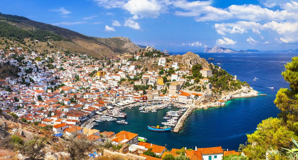 From Athens: Saronic Islands Full-Day Cruise with VIP Seats - Poros in About 50 Minutes: Pine Views, White Houses, and the Clock Tower