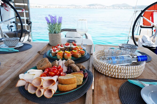 Luxury Catamaran Full Day Private & Greek Gastronomy in Athens - Stop 2: Moni Island Beach, desserts, and that secluded-water feeling