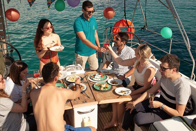 Luxury Catamaran Morning Private & Greek Gastronomy in Athens - Vouliagmeni Beach: historic shoreline time plus the main meal