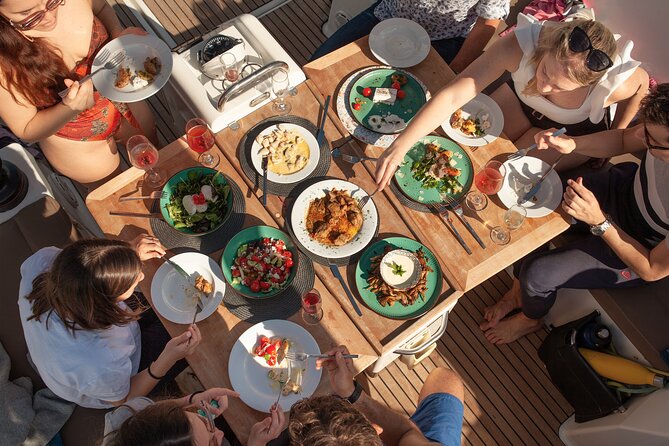 Luxury Catamaran Sunset Private & Greek Gastronomy in Athens - What to bring for a comfortable sunset at sea