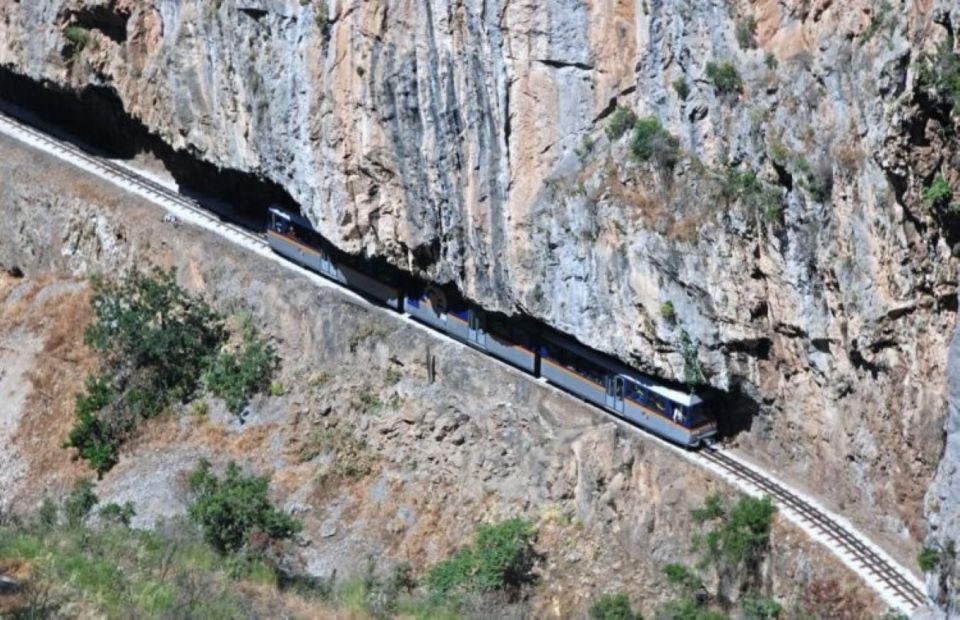 Private Tour to Ancient Corinth, Cave of Lakes & Cog Railway - Cave of Lakes: 13 lakes, hanging bridge, waterfalls, and the walk-in spectacle
