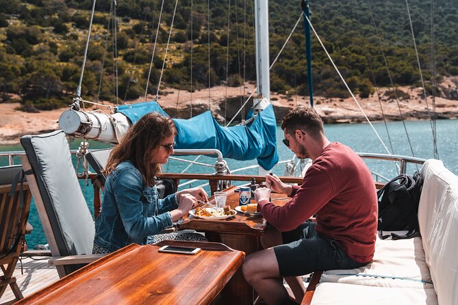 Sunset Dinner Cruise: Sunset, Swim, Drinks, and Dinner Onboard - Ydrousa: clear-water time and calm island vibes