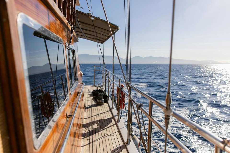 Sunset Dinner Cruise: Swim Stop, Drinks & Onboard Dining - The Ydrousa Island swim stop: what you’ll actually do